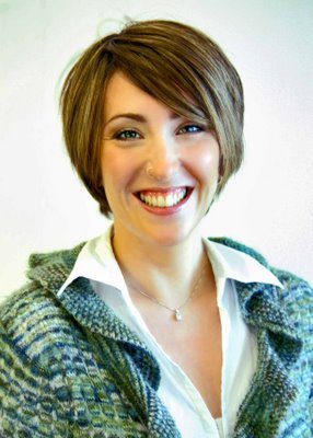 Veronica sits on TV sofa